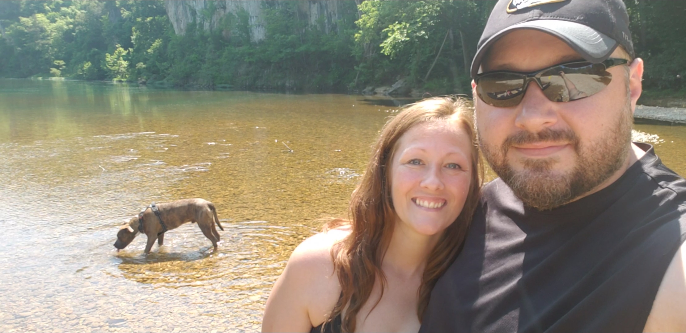 Angel with her husband by the river