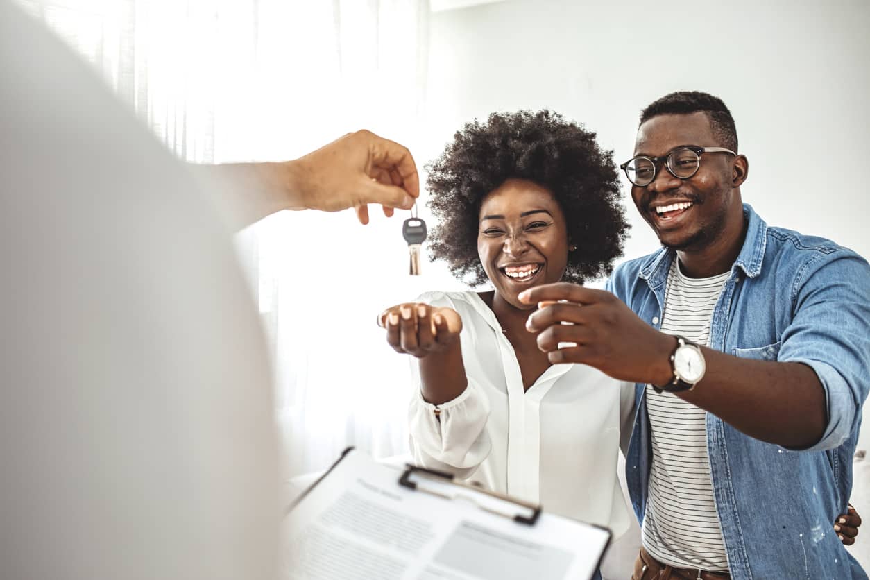 Adjustable Rate Mortgage A couple receiving house keys