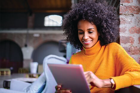 FHA Loan A woman using a tablet