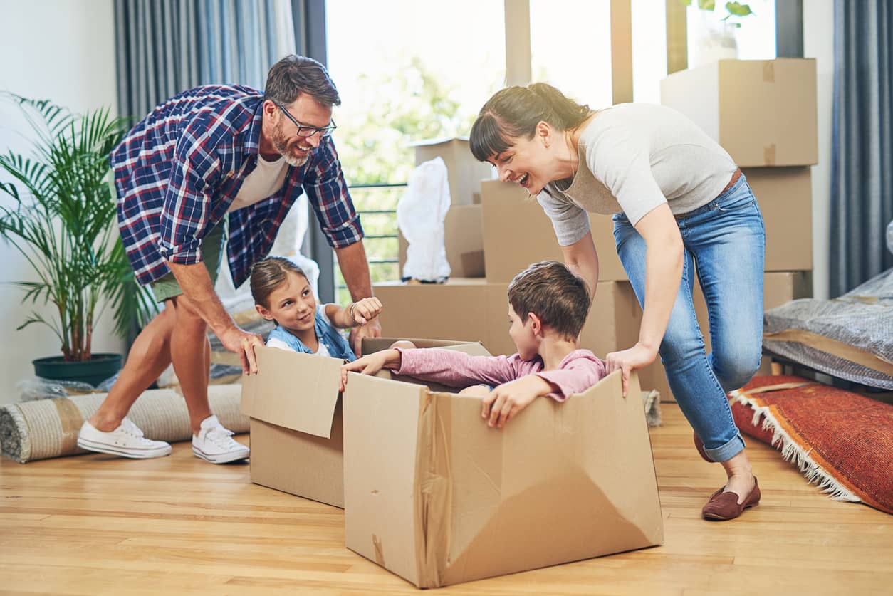 Fixed Rate Mortgage A mom and dad playing with their children