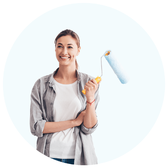 woman holding paintbrush