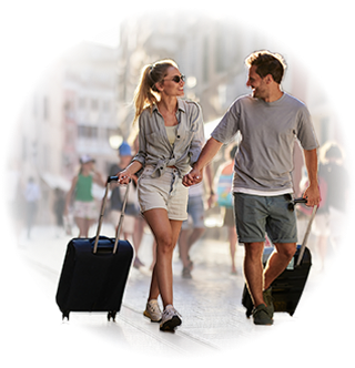 couple with suitcases traveling